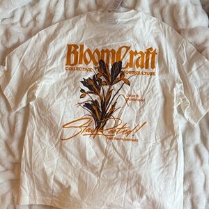 H&M Cream T-Shirt with Orange Graphic